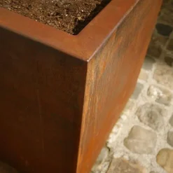 Aflang plantekasse i corten stål med hjul - H.60cm