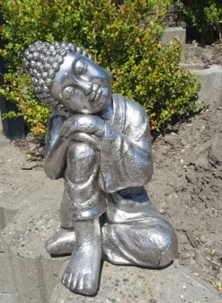 Buddha skulptur i sølv