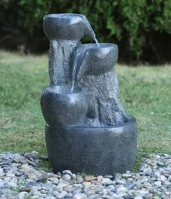 Klippe vandkunst med krukker og LED