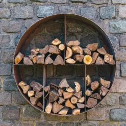 Rund brændereol / brændeskjul i cortenstål til væggen